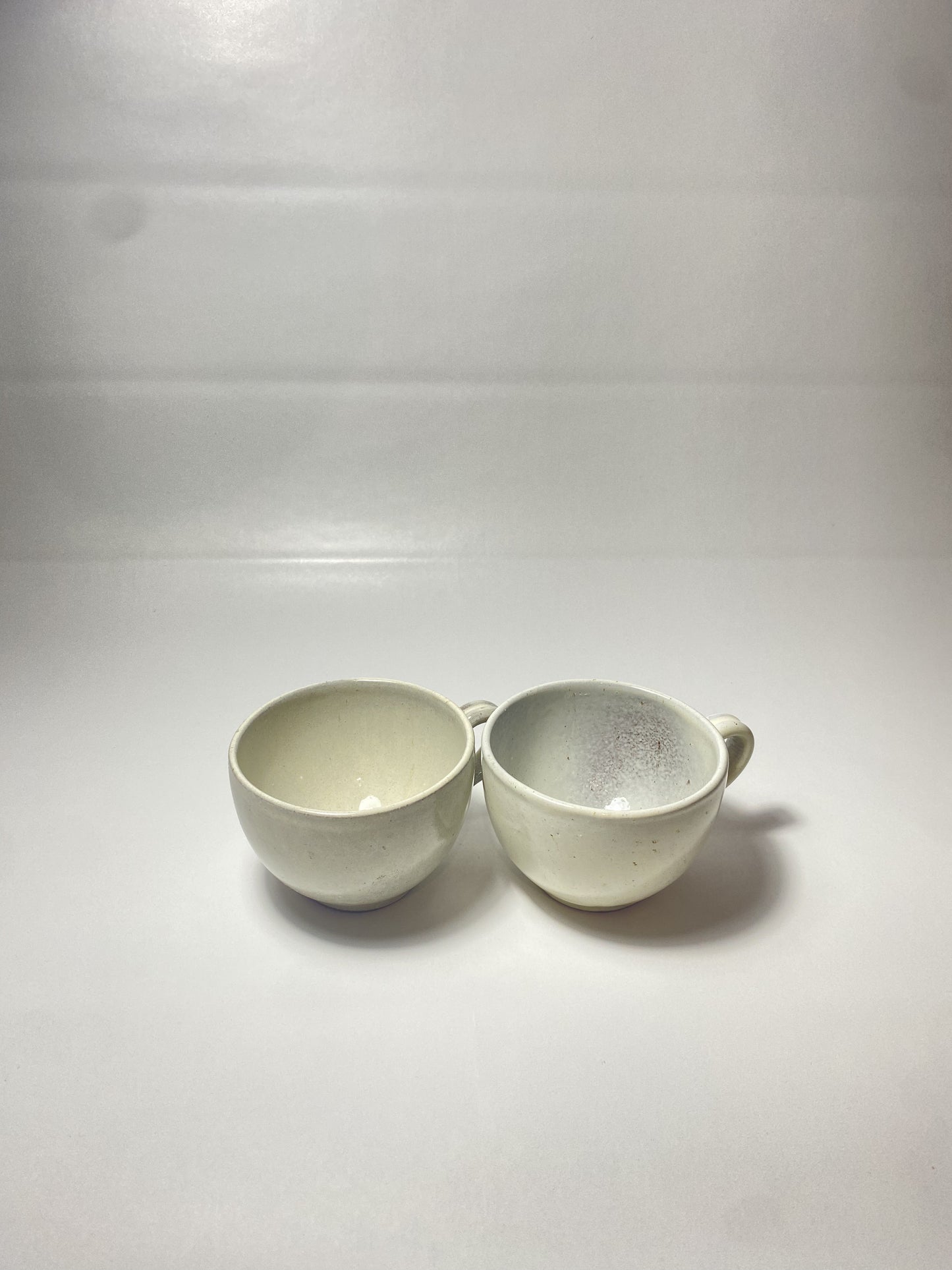 Two small cups of tea set of 2