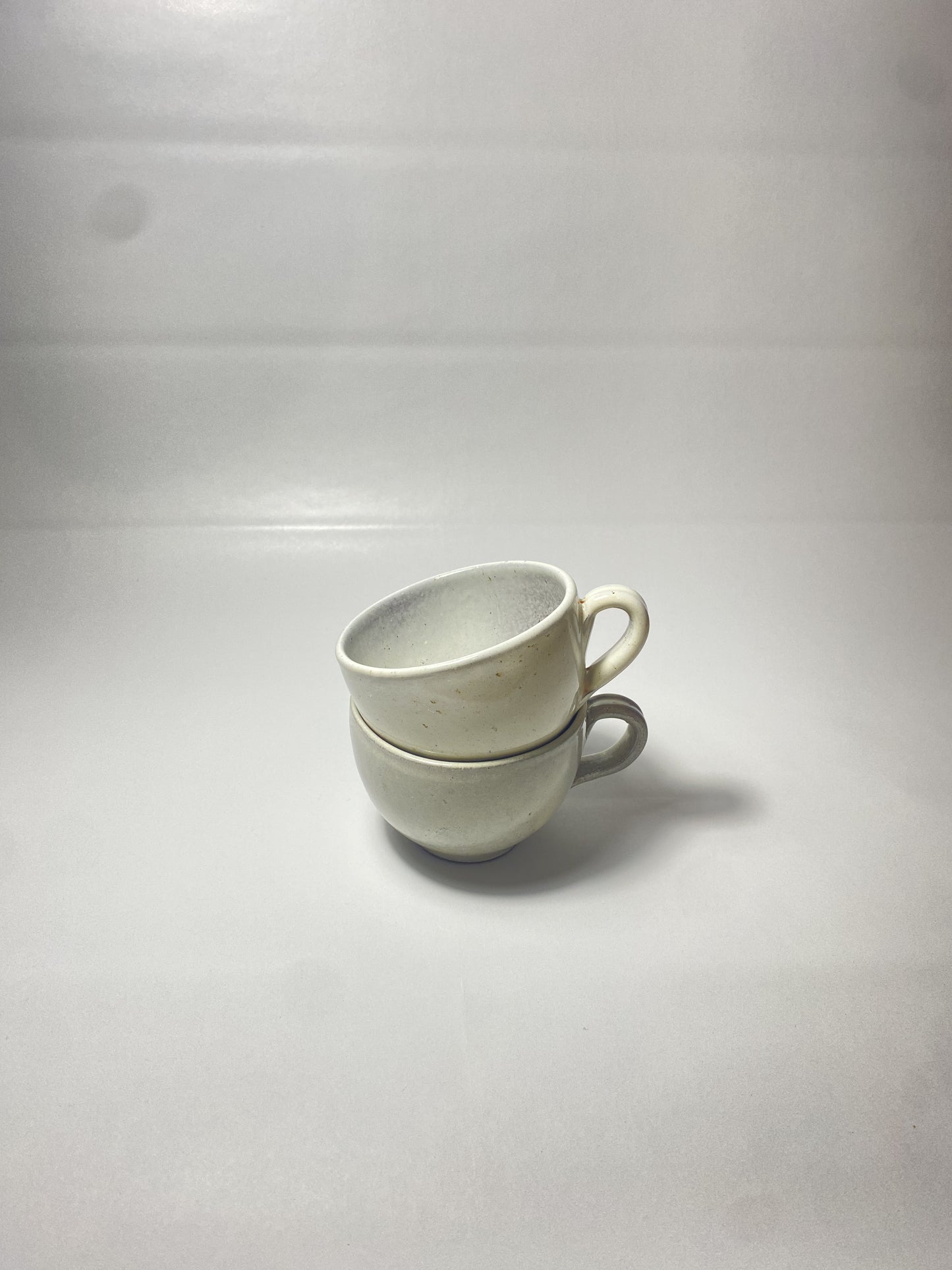 Two small cups of tea set of 2